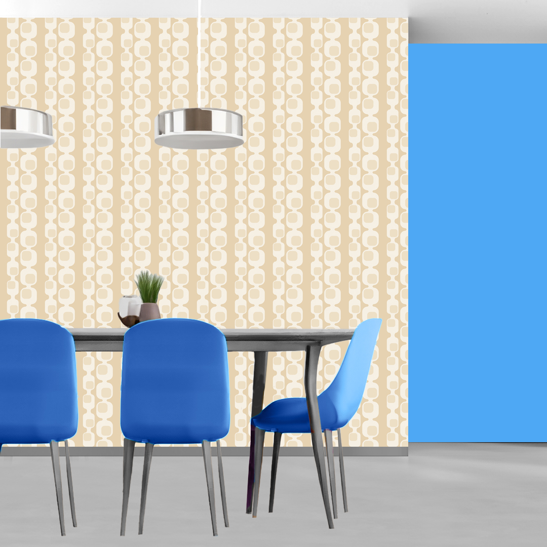 The artwork features a repeating geometric pattern of symmetrical shapes resembling elongated, curved diamonds or petals in various shades of blue and green. Each shape is split vertically with one half filled with a light blue and the other half filled with green or darker blue. The background is a light, almost pastel blue, which provides a soft yet vibrant backdrop. One of the blue shapes near the upper left contains a white starburst element, adding a focal point of brightness to the composition. The overall design conveys a modern, mid-century aesthetic with clean lines and harmonious color contrasts.